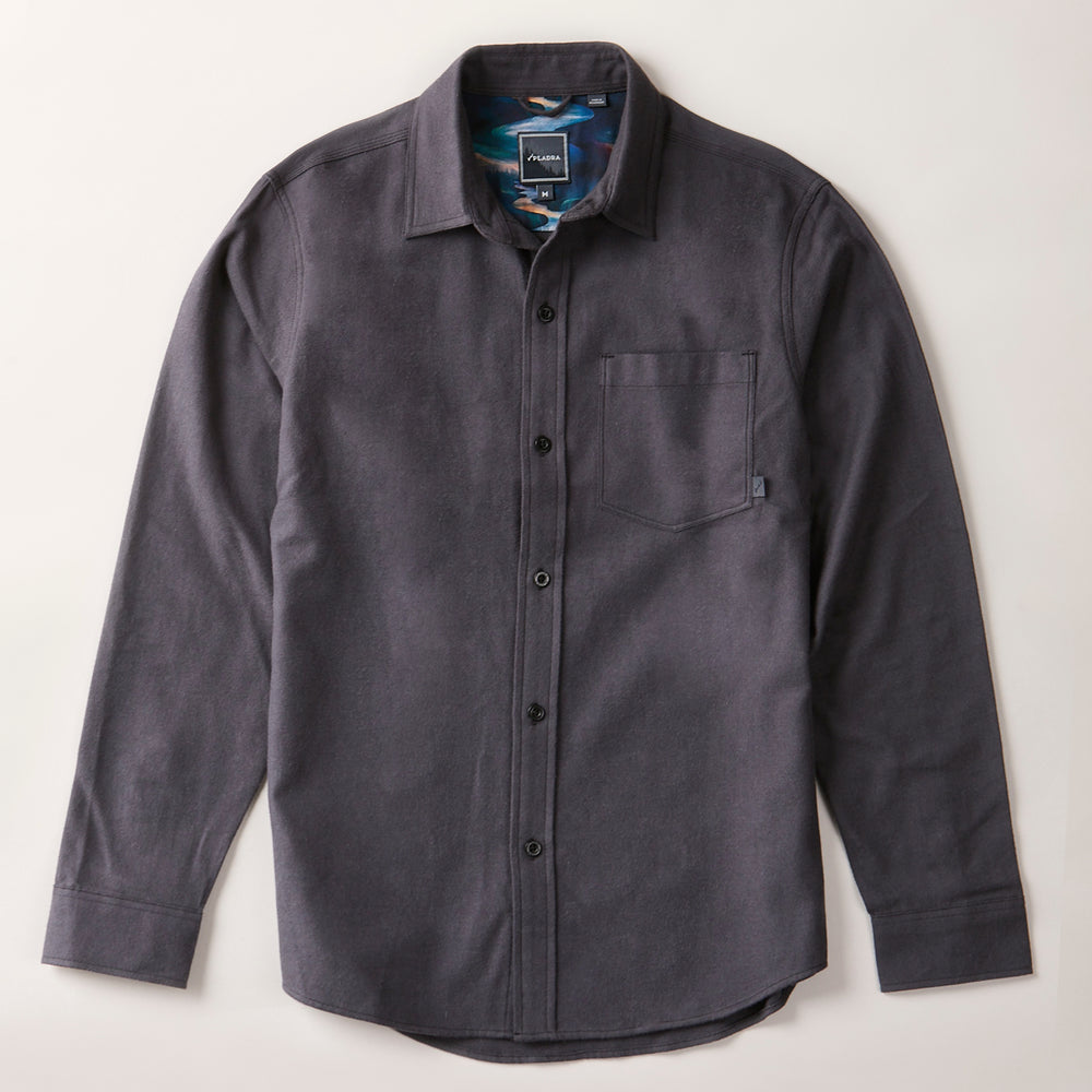 Men's Cascade Flannel Shirt in Charcoal Grey, a Portuguese cotton flannel button-up with a chest pocket and black buttons, shown flat.