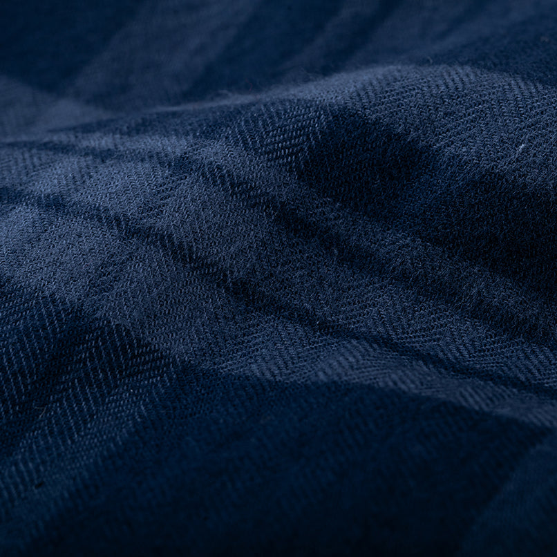 Close-up of Pladra Men’s Every Day Flannel Shirt in Cloud Blue, showing its soft texture and subtle line details.