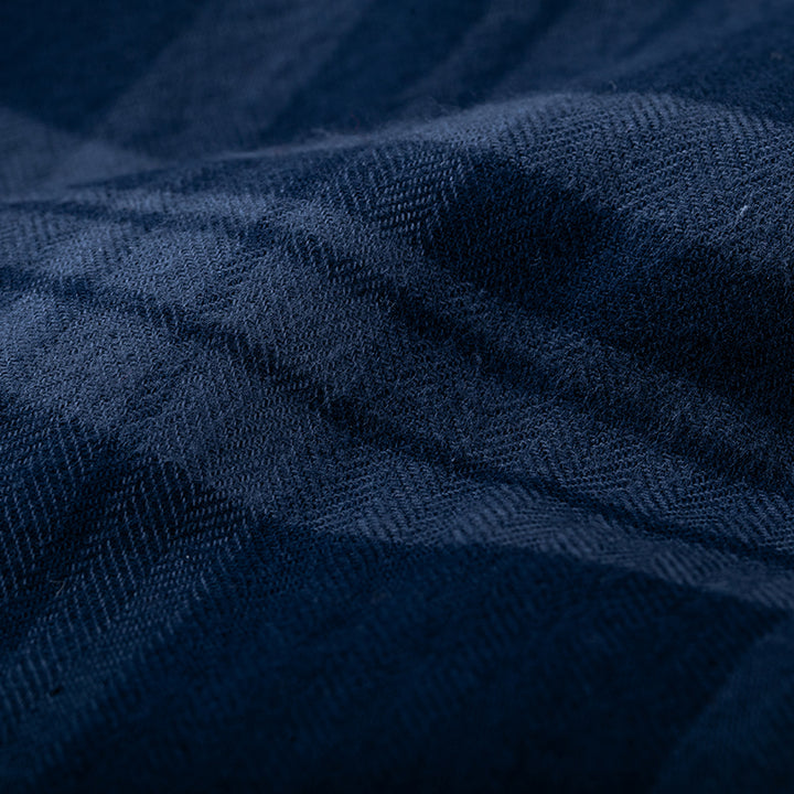 Close-up of Pladra Men’s Every Day Flannel Shirt in Cloud Blue, showing its soft texture and subtle line details.