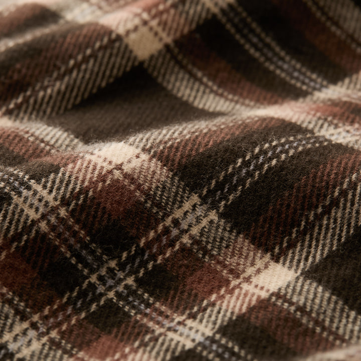 Close-up of soft, textured fabric in a brown, cream, and black plaid highlights the cozy warmth and durability of the Men&