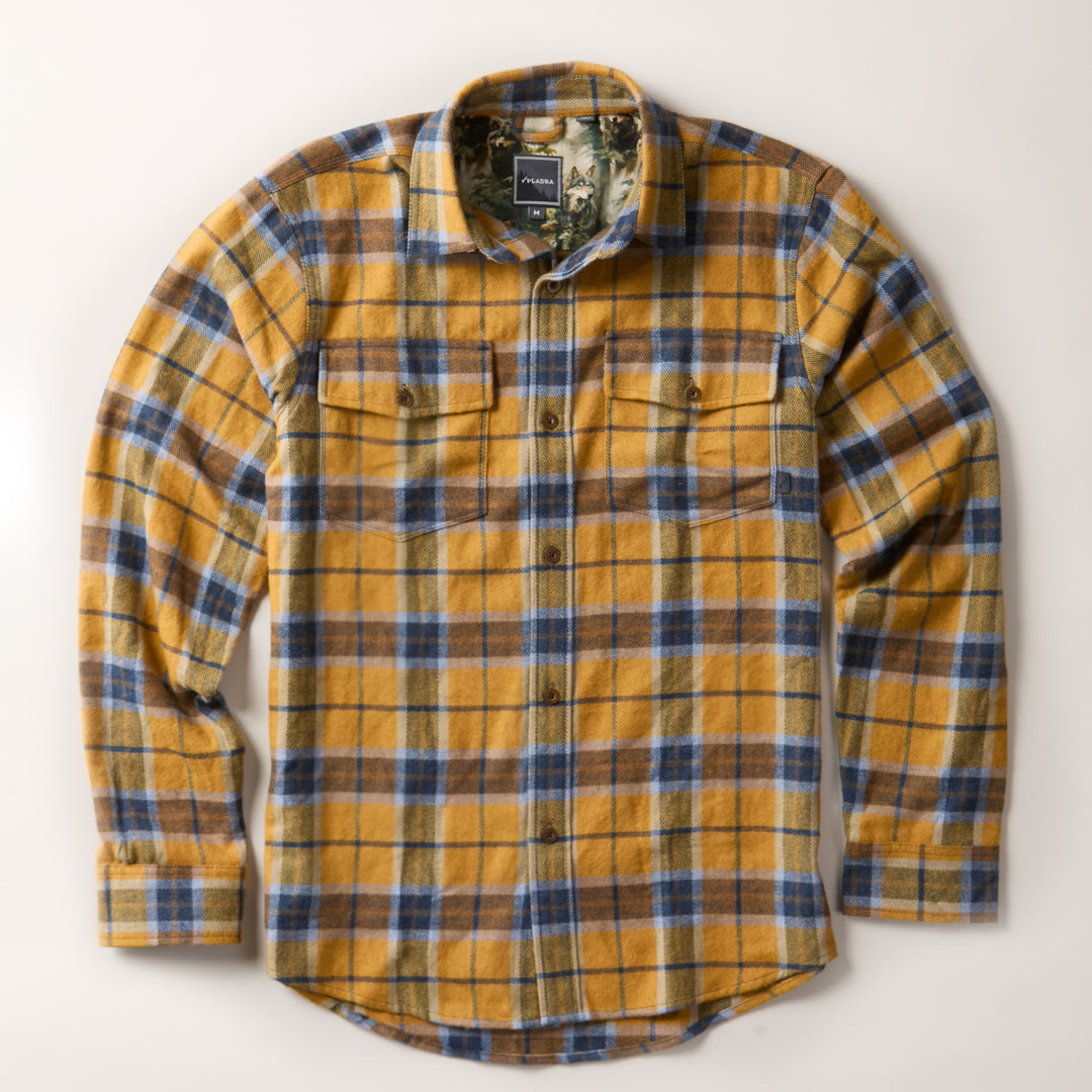Pladra Men's Workhorse Elite Flannel Shirt in Easton Gold, long sleeve with two chest pockets, shown laid flat.