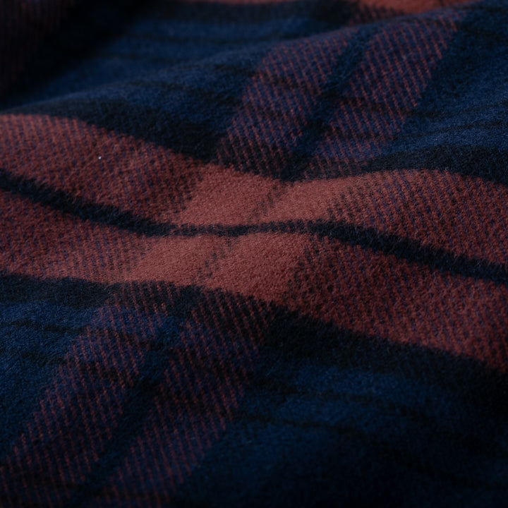 Close-up: Pladra Men’s Every Day Elite Flannel Shirt in Farallon Blue—soft, brushed plaid fabric with diagonal lines.
