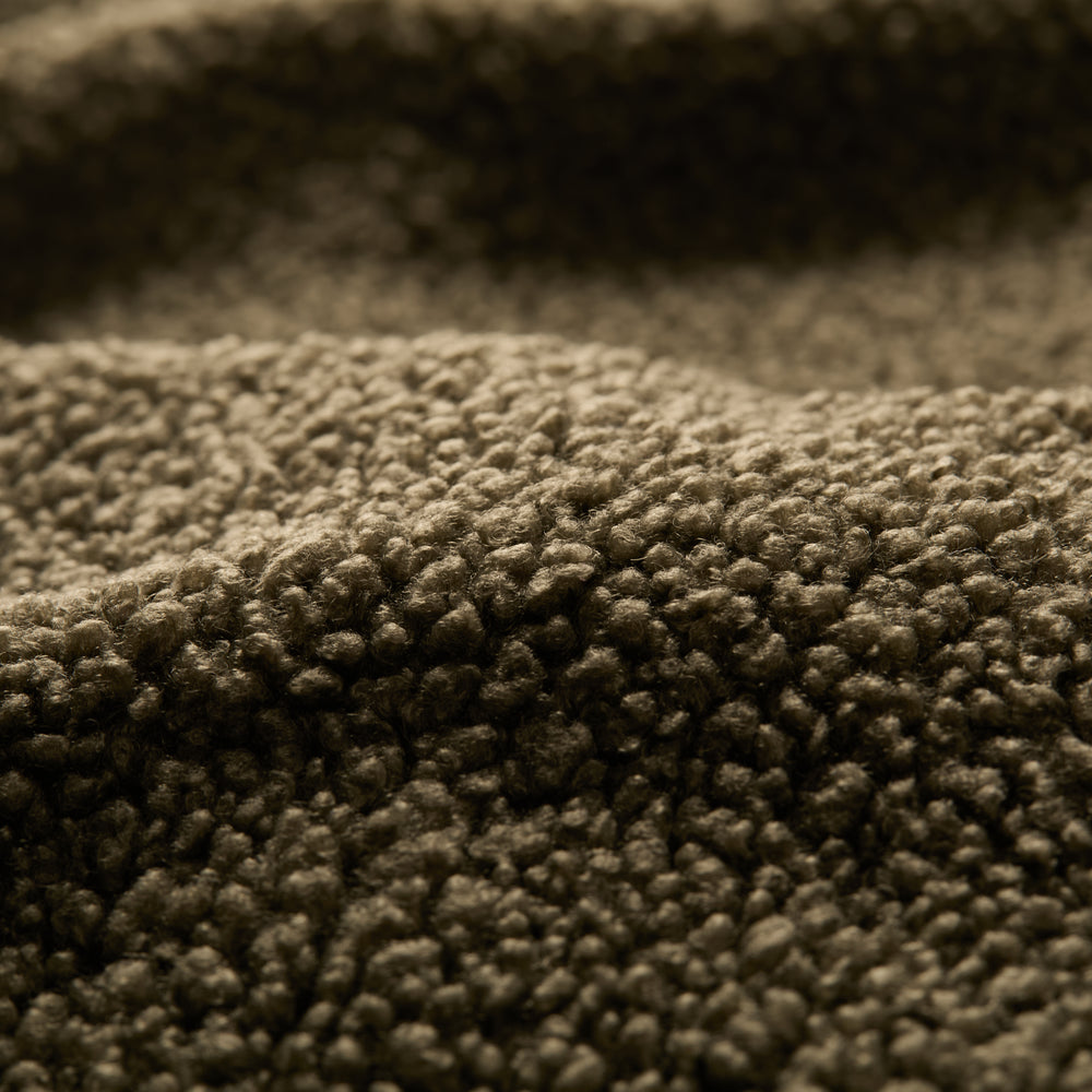 Close-up of the Men's Cypress Sherpa Fleece in Forest Green, highlighting its heavyweight fleece fabric with soft, fuzzy fibers and gentle surface folds.