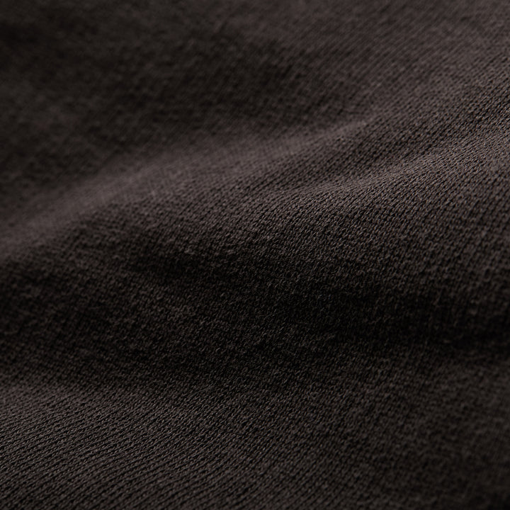 Close-up of Pladra Men's Sierra Hoodie-Charcoal Black, showing heavyweight French terry texture and soft folds.