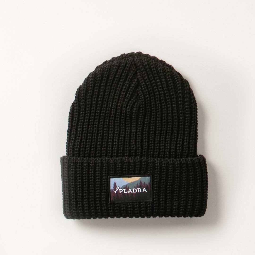 Pladra Woodsman Heavyweight Cuff Beanie in black; classic fit, folded brim, mountain patch; made in USA.