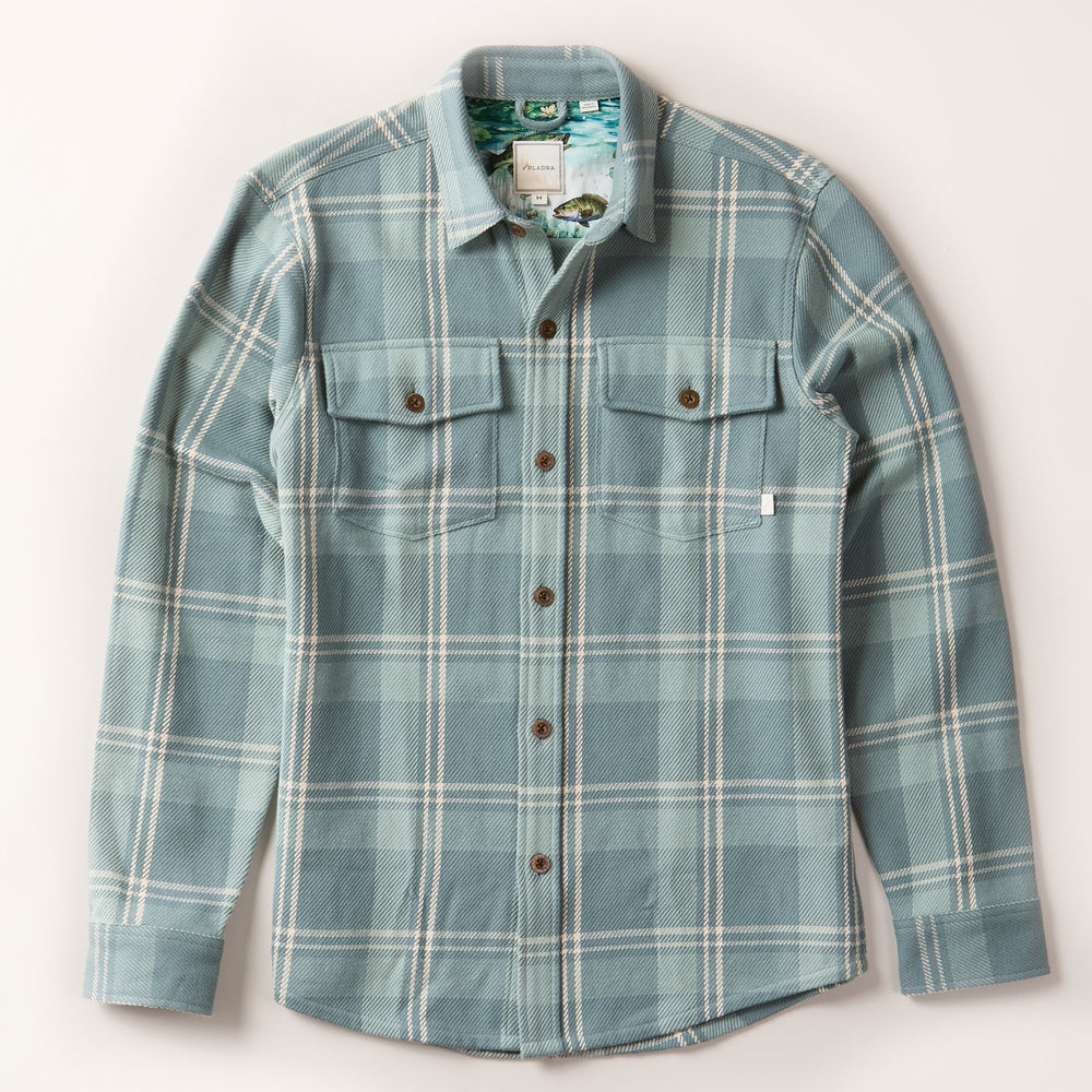 Pladra Men's Fireside Flannel in Island Blue with button front, two chest pockets, and long sleeves on white background.