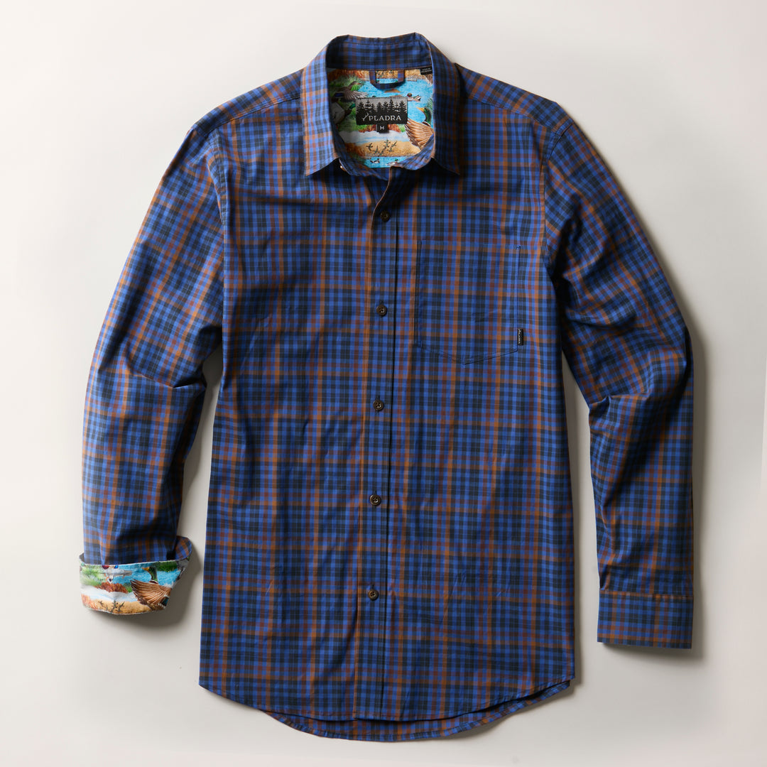 Pladra Men's Tailwinds Shirt in Lagoon Blue with decorative inner cuffs, laid flat on a white background.