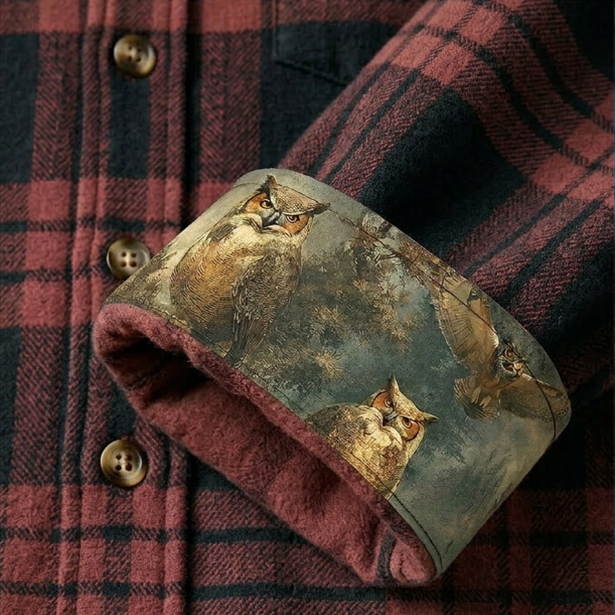 A Pladra Men's Every Day Elite Flannel Shirt in Farallon Grey cuff turned up, revealing a detailed owl print lining.