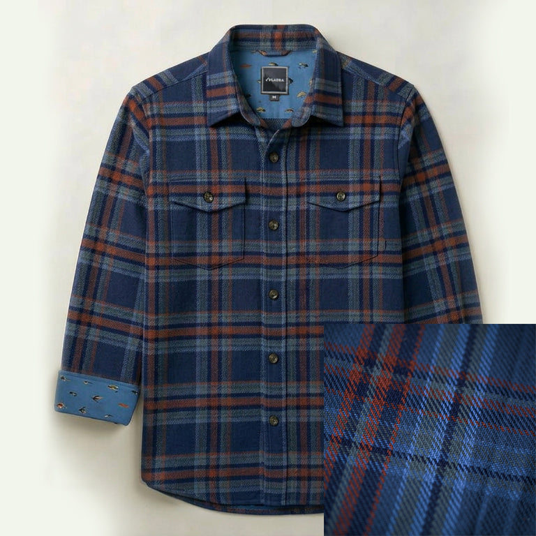 Pladra Men's Fireside Flannel in Missoula Blue with fish-patterned lining and orange, gray plaid accents.
