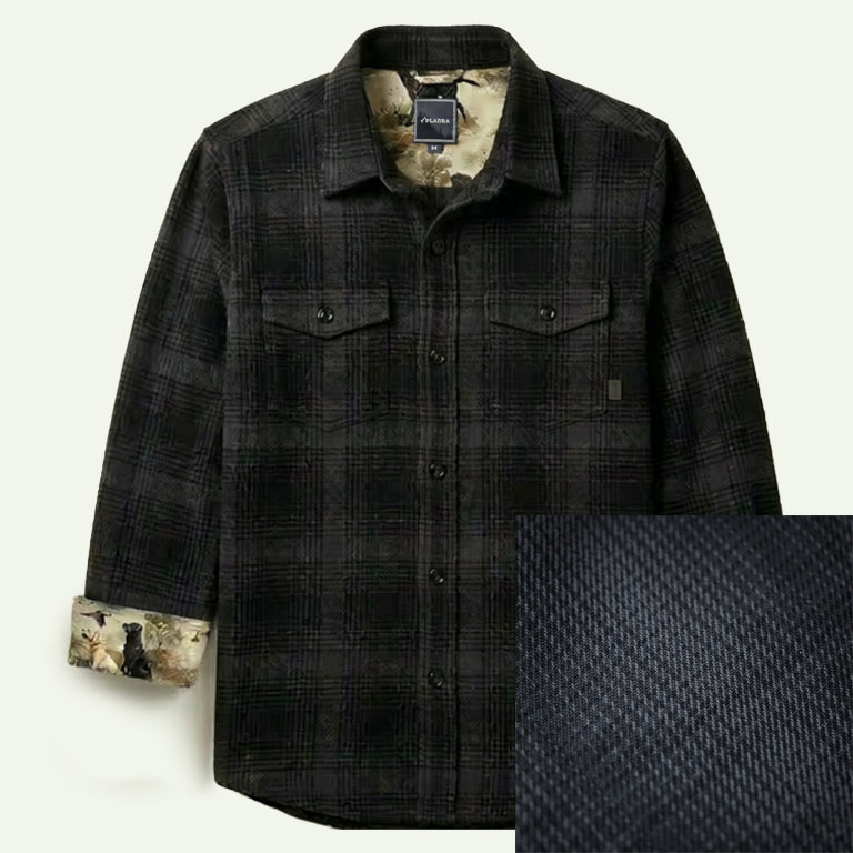 Men's Fireside Flannel in Night Black, a heavyweight organic cotton black plaid with two chest pockets and contrasting inner lining.
