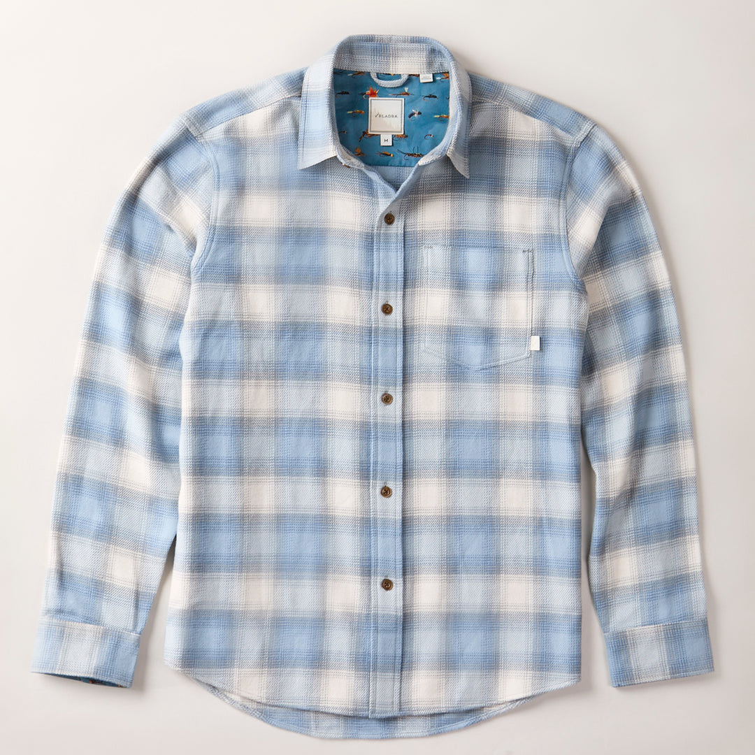 The Men's Every Day Elite Flannel Shirt - Mendocino Blue features a light blue, white, and gray plaid pattern, single chest pocket, and a light blue inner lining with subtle prints—ideal as an outdoor flannel for style and comfort.