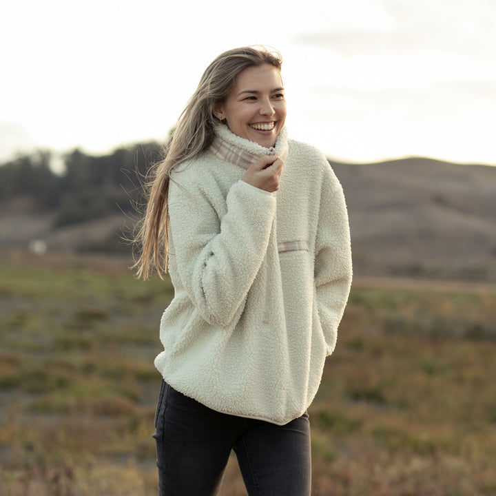 Smiling woman wears the Pladra Women&