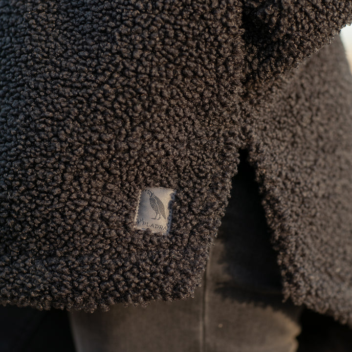 Close-up of a textured, dark Women&