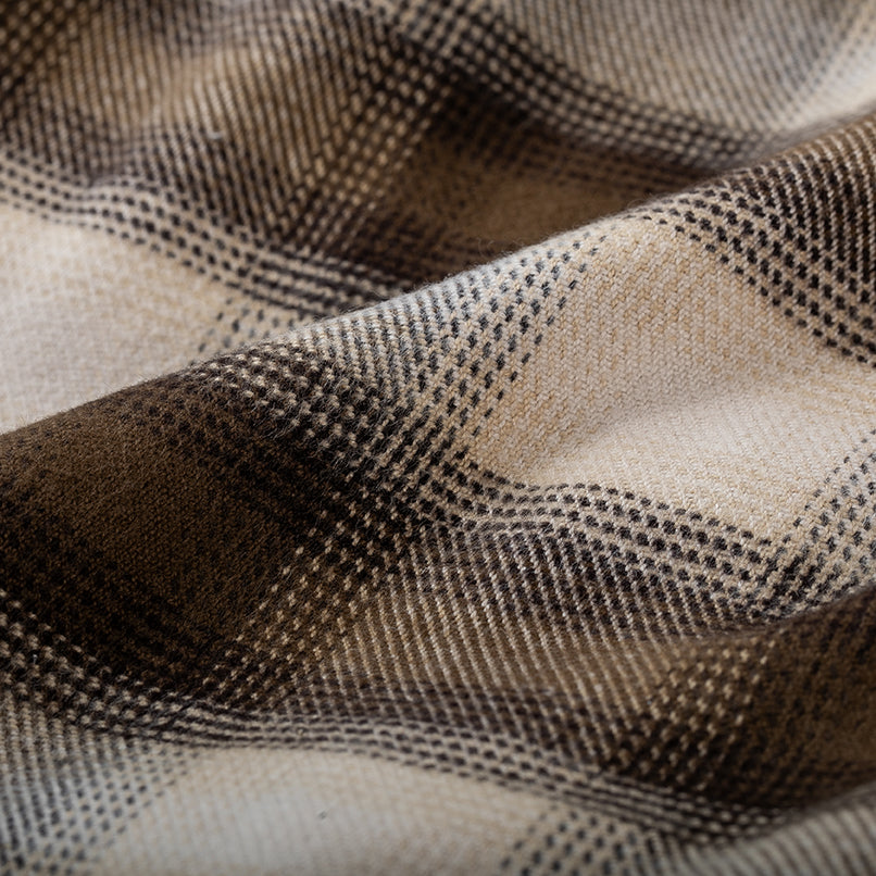 Close-up of Pladra Men’s Every Day Elite Flannel Shirt in Retriever Tan, highlighting its soft, textured plaid fabric.