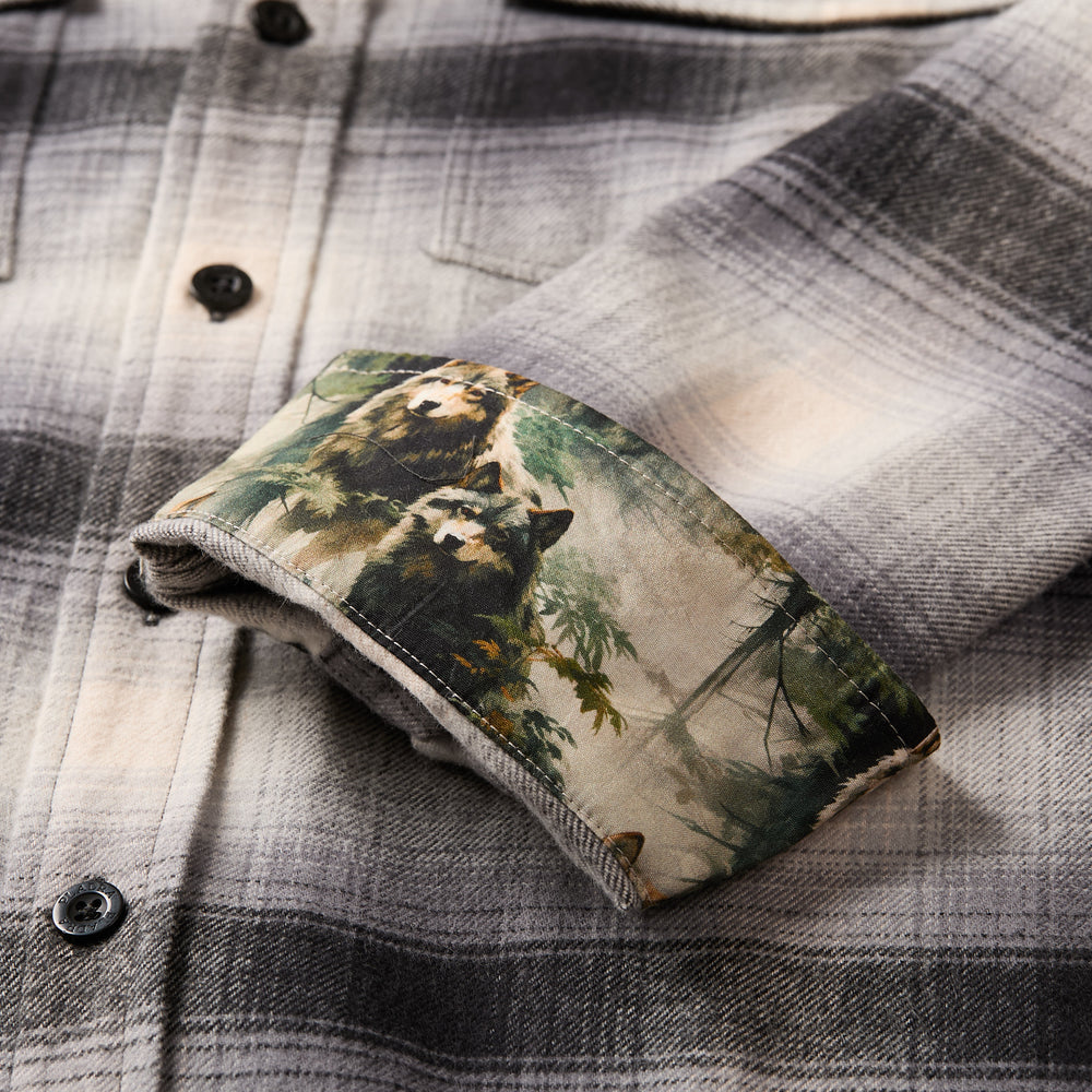 Pladra Men's Workhorse Flannel Shirt in Sterling Grey Heather with turned-up cuffs showing bear-printed lining.