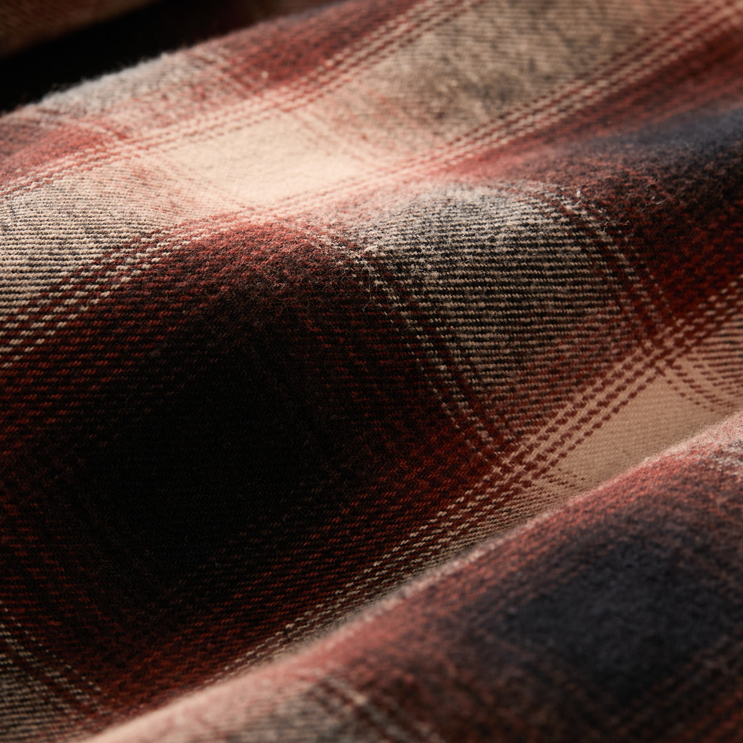 Close-up of soft plaid flannel on Pladra’s Men&