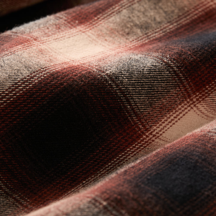 Close-up of soft plaid flannel on Pladra’s Men&