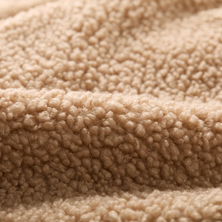 Close-up of soft, textured fleece from Pladra Women&
