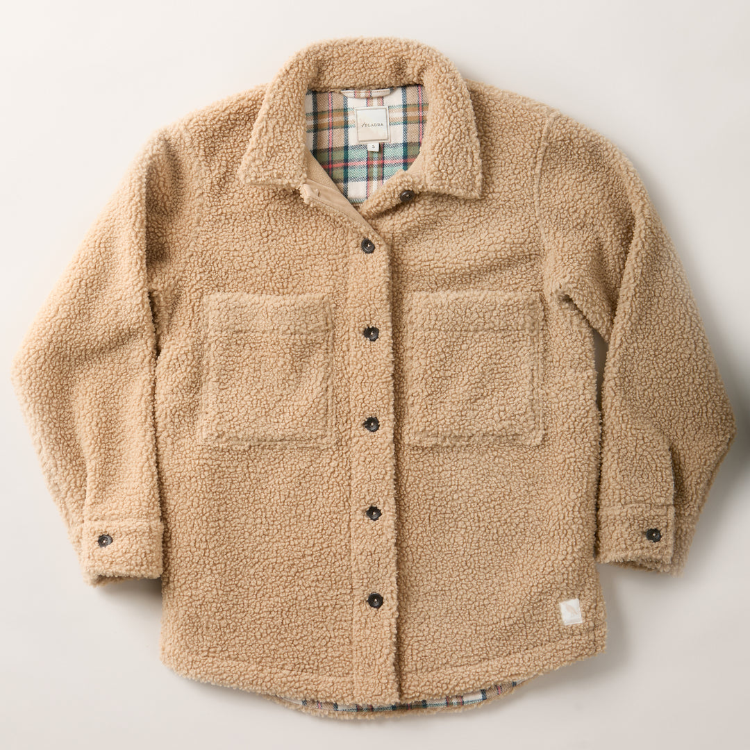 Pladra Women’s Headlands Sherpa Shacket in Almond Tan with chest pockets and plaid flannel lining, laid flat.