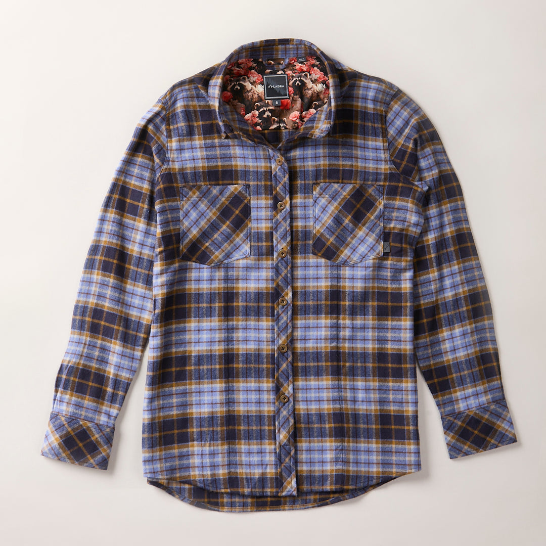 Plaid shirt with floral lining on a light gray background