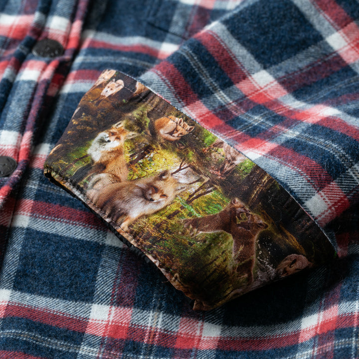 A glasses case with a fox pattern rests on the Women&