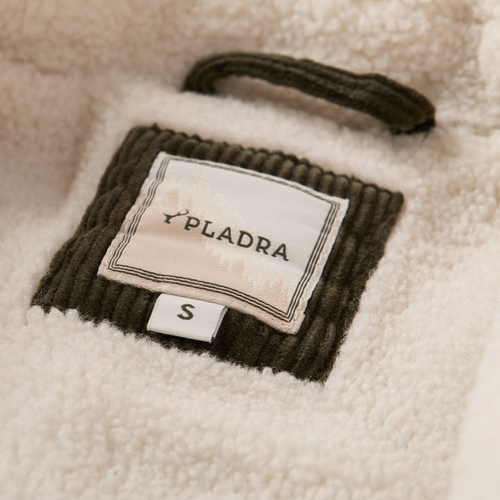 Close-up of a Pladra tag marked S on a Women&