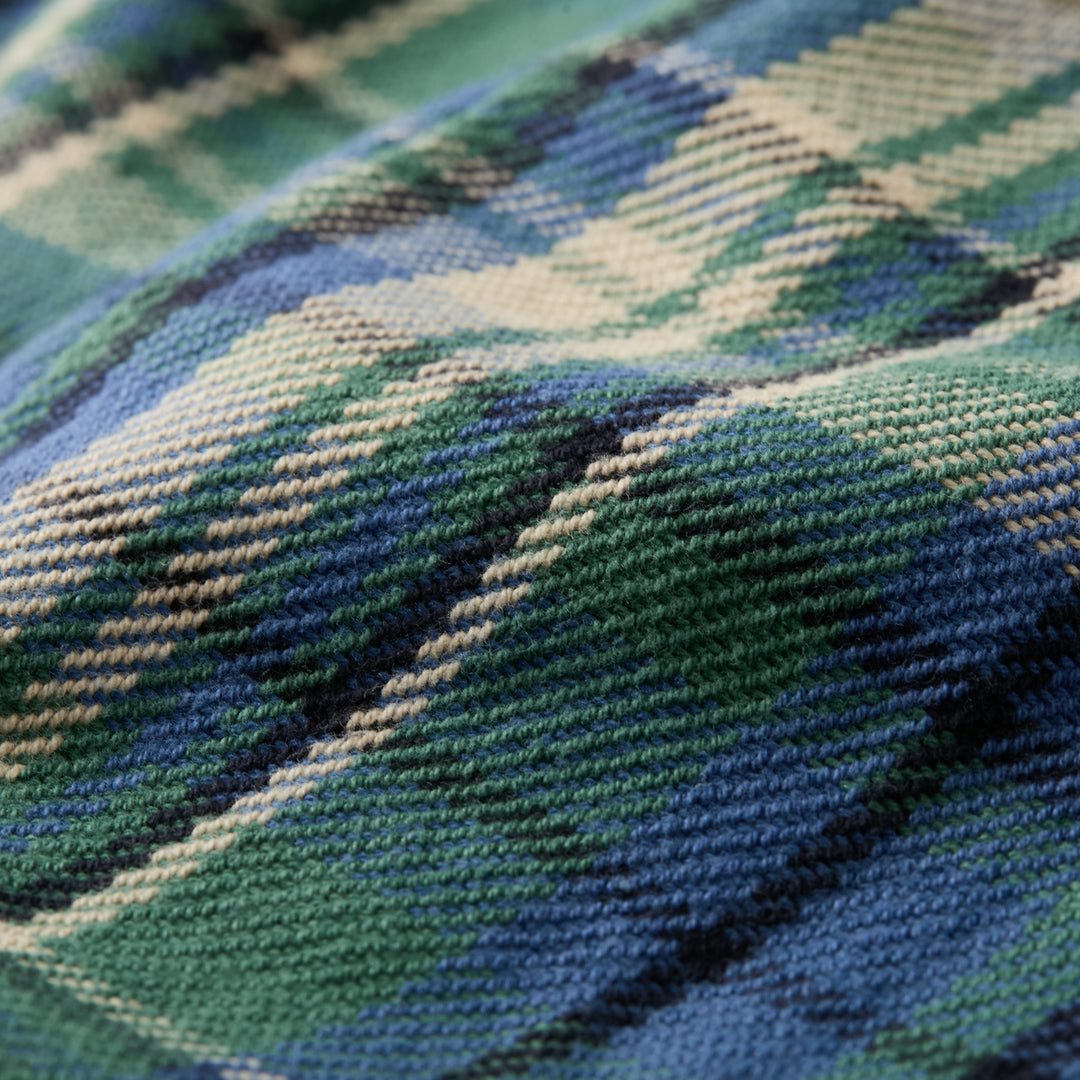 A close-up of the woven texture and subtle folds in the Women&