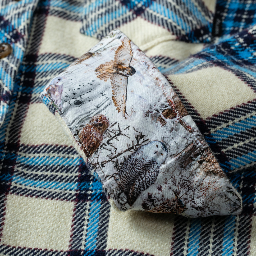 An owl-patterned cloth rests on a Pladra Women&