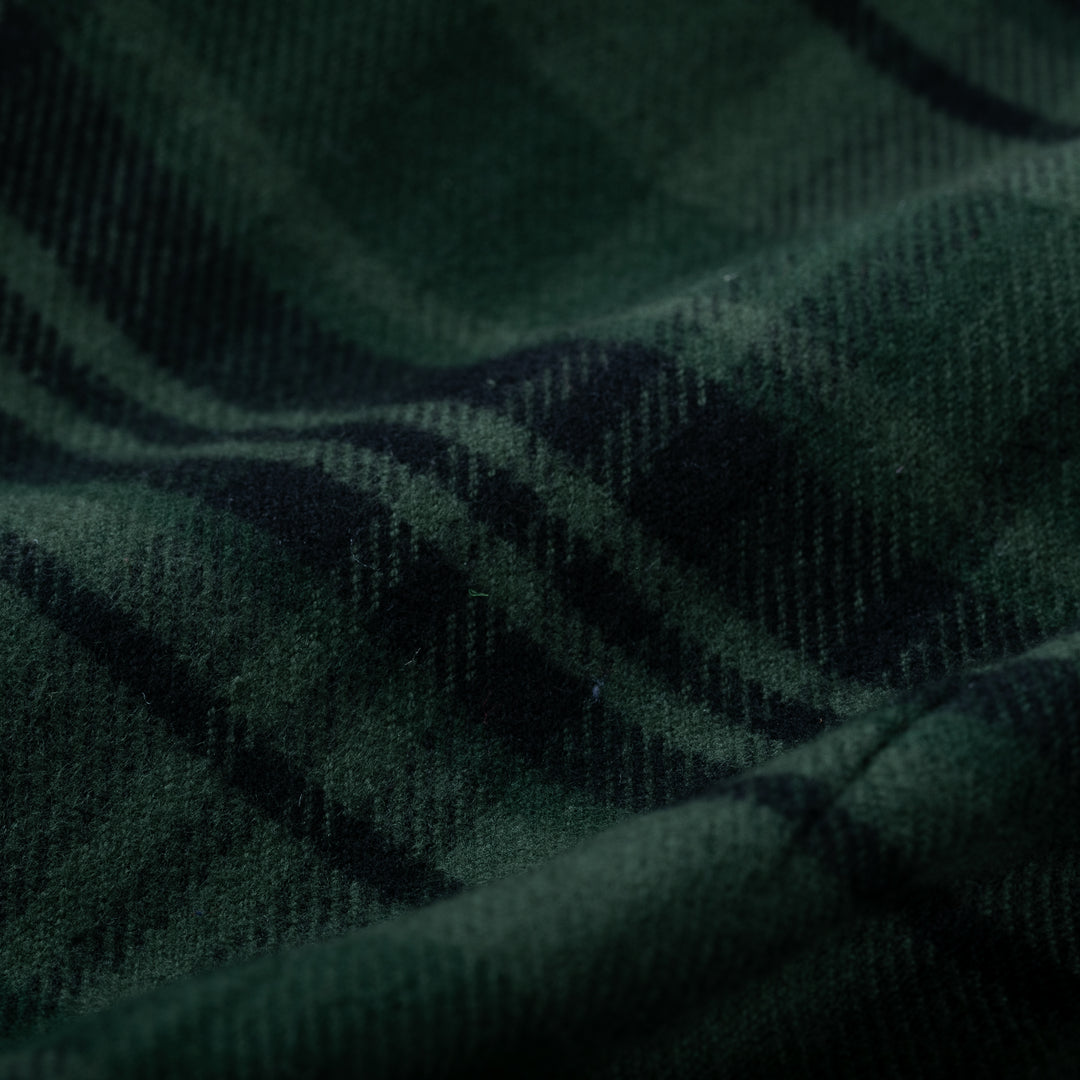 Close-up of Pladra Women’s Every Day Elite Flannel Shirt in True Green shows soft folds, texture, and plaid pattern.
