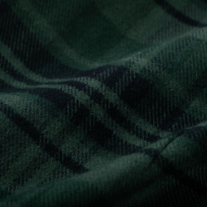 Close-up of Pladra Women’s Every Day Elite Flannel Shirt in True Green shows soft folds, texture, and plaid pattern.