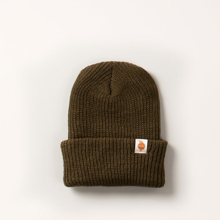 Pladra Watch Cap Beanie in olive green with folded brim, orange logo patch, made in USA, shown on white background.