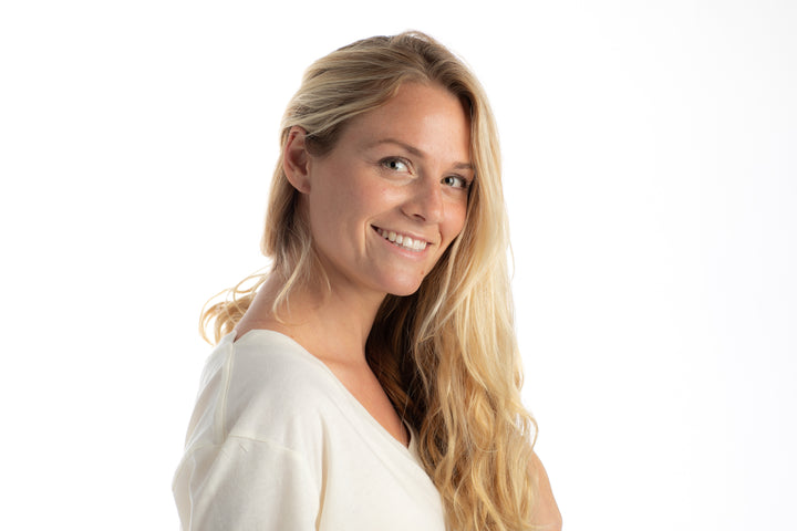 Smiling woman in a Pladra Women&