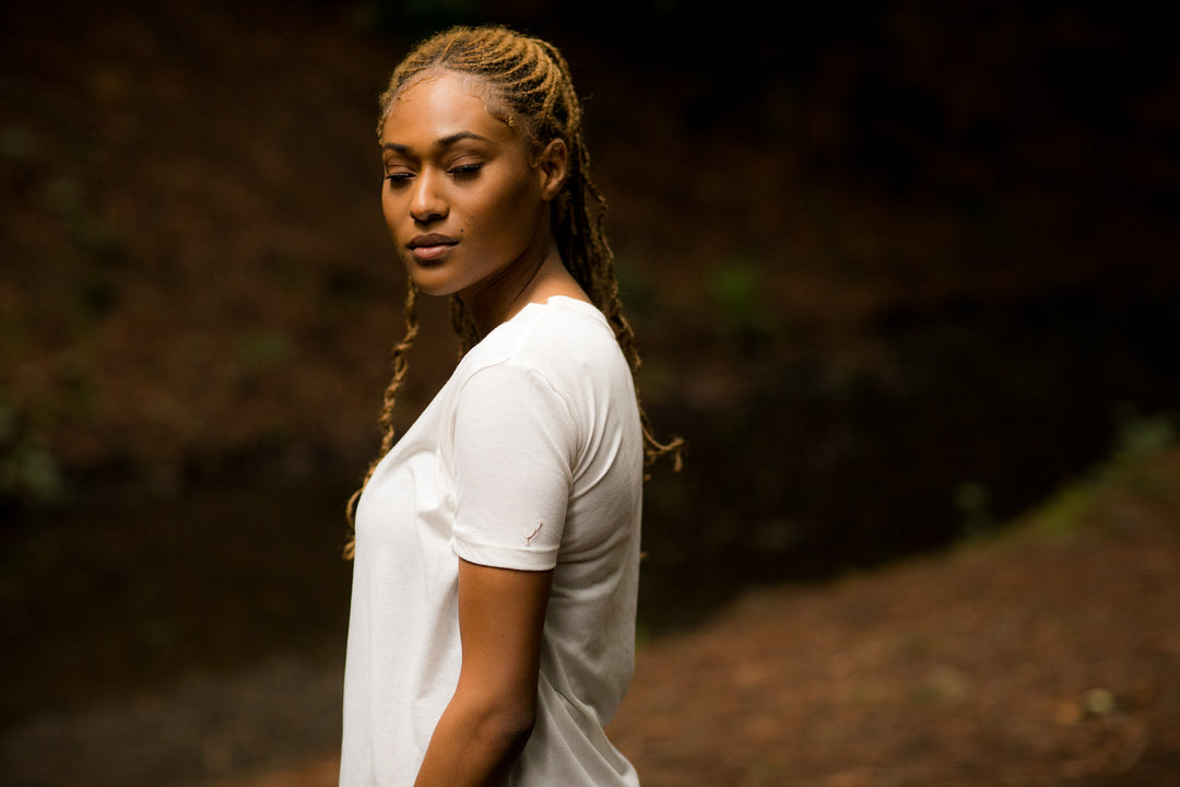 Woman with braided hair wears a Pladra Women&
