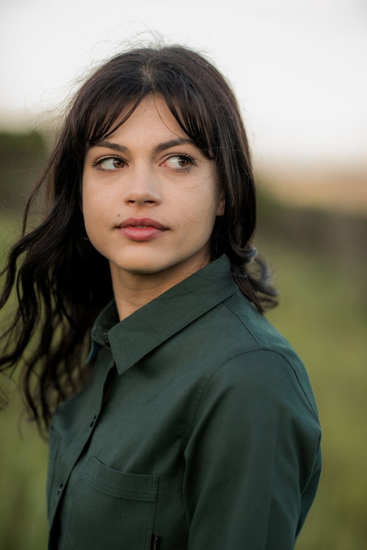 Woman with dark hair in a Pladra Women&