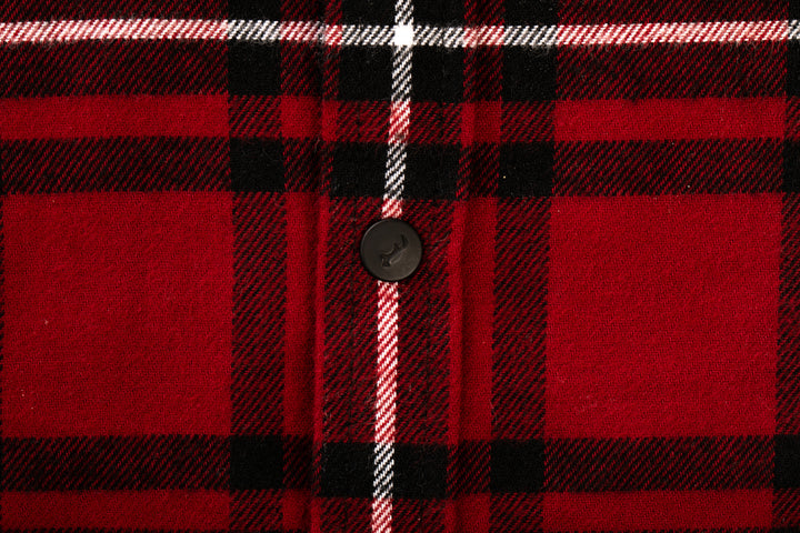Close-up of the Toddler Cubs Flannel Shirt- Rocky Red, showcasing premium cotton flannel in a red, black, and white classic tartan plaid pattern with a single black center button.