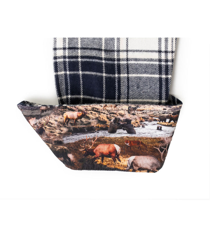 The Toddler Cubs Flannel Shirt in Butte Blue features premium cotton flannel with a panel partially covered by fabric printed with elk or reindeer grazing near water amid trees and rocks.