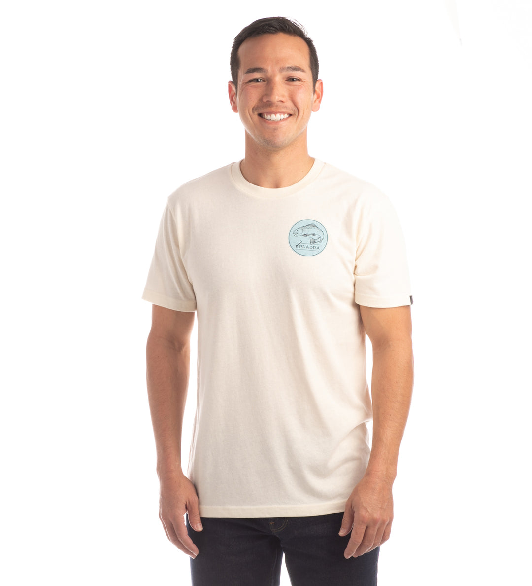 A man smiles while wearing the Men&