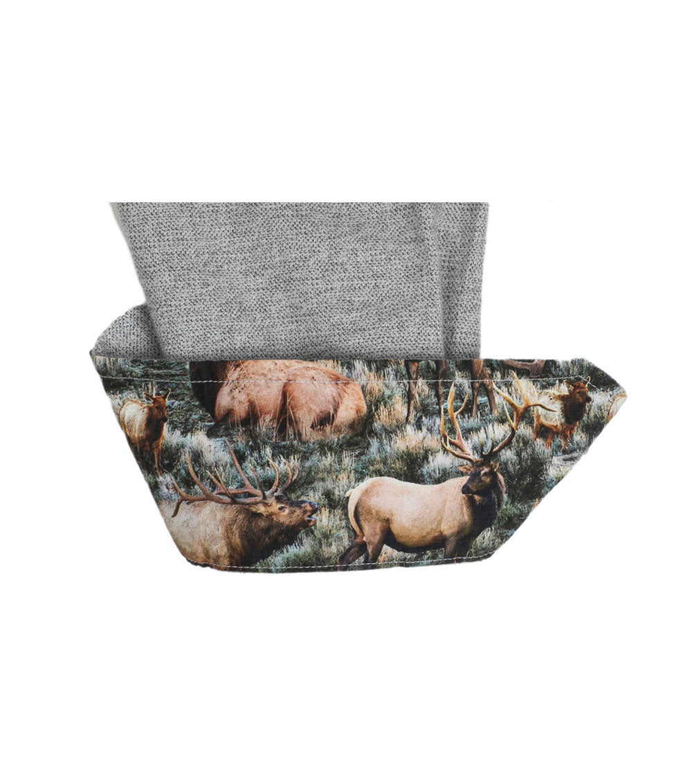 Rectangular fabric basket with gray lining, featuring an elk print inspired by Pladra's Cascade Flannel Shirt.
