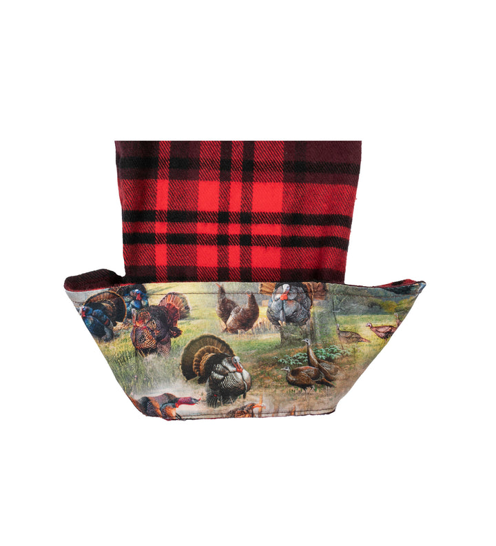 A fabric basket with a red and black plaid lining inspired by the Women&